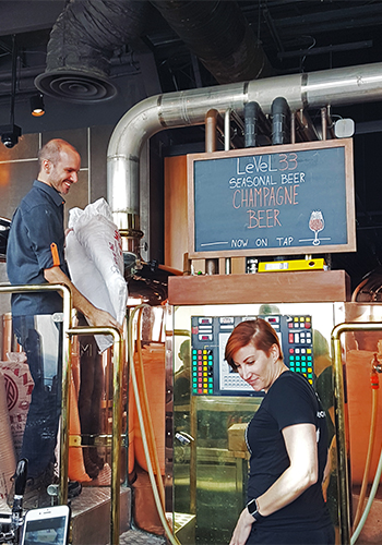 Jayne Lewis and Gabriel Garcia at LeVel33 brewery in July 2018