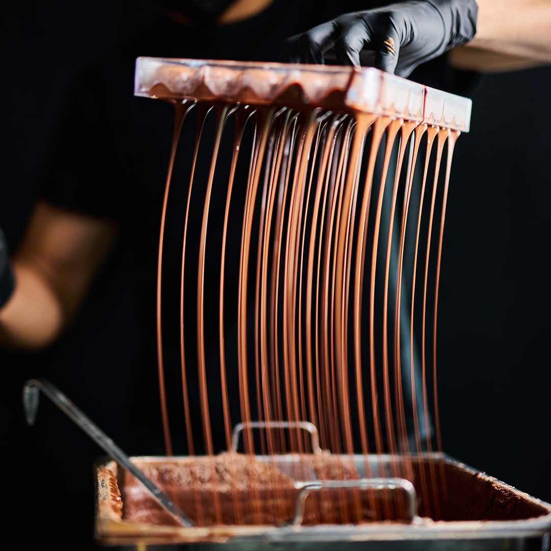 Making of chocolate bon bon in Chocolate Concierge's kitchen