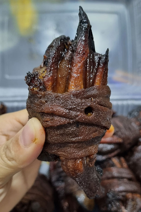 Ngap Keok Bao Kepong duck feet wrapped in stomach with liver