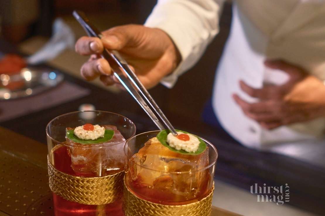 Phirun Lek Sora Phnom Penh garnishing his winning cocktail