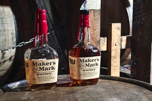 Makers-Mark-Bourbon-Bottles-on-Barrel-in-Cave-Cellar.jpg